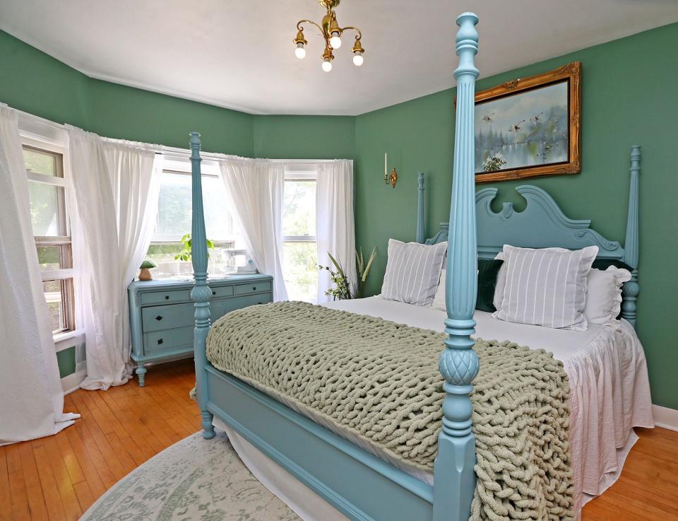 The homeowner has removed 1980s wallpaper and painted walls in vibrant colors.