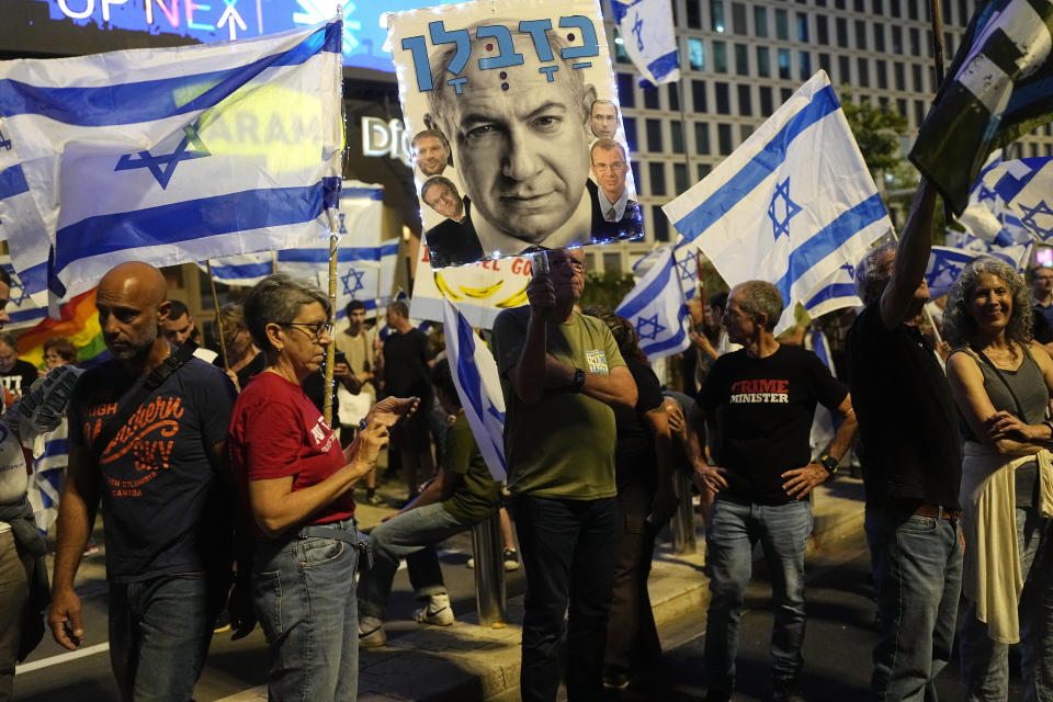 Israelis protest plans by Prime Minister Benjamin Netanyahu's far-right government to overhaul the judicial system, in Tel Aviv, Israel, Saturday, May 27, 2023. (AP Photo/ Ohad Zwigenberg)