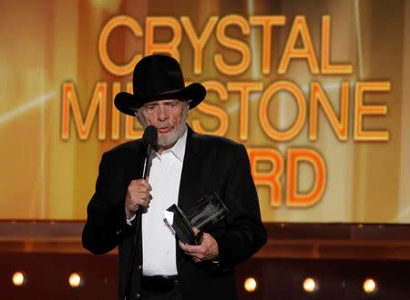 Merle Haggard accepts the Crystal Milestone Award at the 49th Annual Academy of Country Music Awards in Las Vegas, Nevada in this file photo dated April 6, 2014. REUTERS/Robert Galbraith