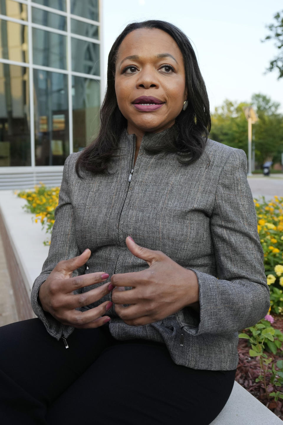 U.S. Assistant Attorney General Kristen Clarke of the Justice Department's Civil Rights Division, says at a June 1, 2023 stop of the division's civil rights tour in Jackson, Miss., that the Justice Department is still investigating the January raid that led to the shooting of Michael Corey Jenkins by Mississippi sheriff's deputies. Clarke spoke to The Associated Press during the second of three stops in the state during her "listening tour" through the Deep South. (AP Photo/Rogelio V. Solis)