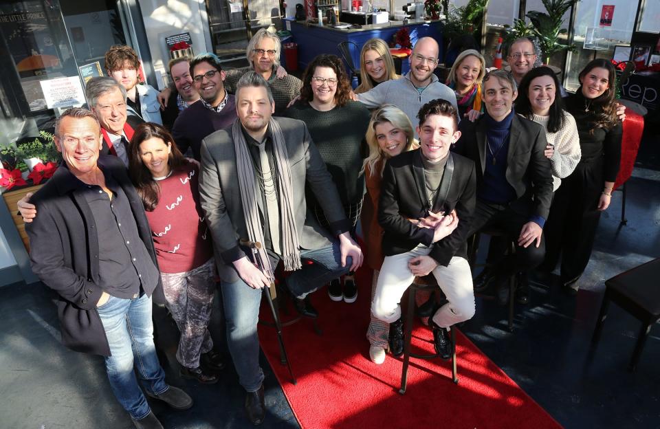 The team of Seacoast Repertory Theatre including actors and board members pose for a united picture in their lobby following the protest outside the theater by a hate group this past weekend.