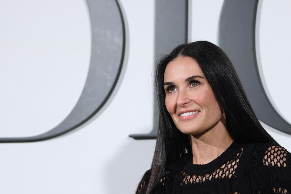 US actress Demi Moore poses during the photocall prior to the Dior Women's Fall-Winter 2020-2021 Ready-to-Wear collection fashion show in Paris, on February 25, 2020. (Photo by Anne-Christine POUJOULAT / AFP) (Photo by ANNE-CHRISTINE POUJOULAT/AFP via Getty Images)