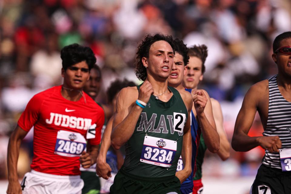 McNeil's King Grimm competes in the boys 6A 800-meter run Saturday at the UIL state track and field meet.