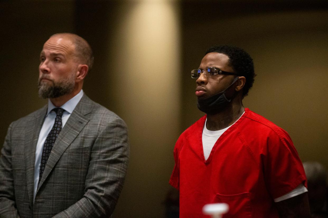 Attorney Luke Evans and Justin Johnson, the man accused of shooting Young Dolph, listen to Judge Lee V. Coffee during an appearance in the Shelby County Criminal Court in Memphis, Tenn., on Friday, July 14, 2023. 