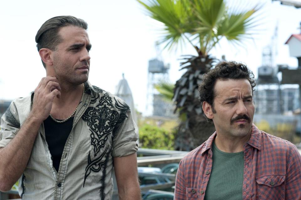 This publicity image released by Sony Pictures Classics shows, Bobby Cannavale, left, and Max Casella in a scene from "Blue Jasmine." (AP Photo/Sony Pictures Classics)