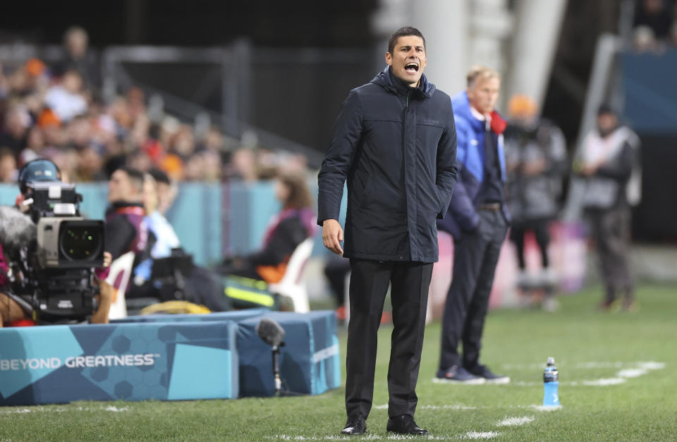 Portugal coach Francisco Neto is pictured on the sidelines during the Women's World Cup soccer match against the Netherlands in Dunedin, New Zealand, Sunday, July 23, 2023. The group stage was the source of enormous national pride for Portugal, the Philippines, Vietnam, Panama, Ireland, Haiti, Zambia and Morocco, all newcomers to the highest level of international women's soccer. (AP Photo/Matthew Gelhard)