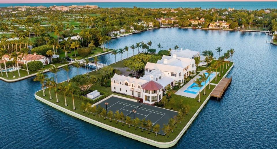 A remodeled-and-expanded house on Tarpon Island, Palm Beach's only private island, is taking a summer break from the multiple listing service after being listed last last season at $218 million as the most expensive residential property in town.