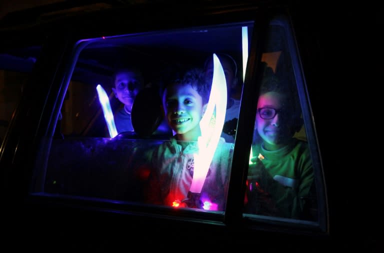 Libyan children gather in the city of Benghazi on November 19, 2018 to mark the Prophet Mohammed's birthday