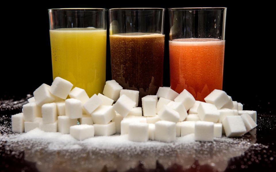 Soft drinks will have to cut sugar by 2018 or face being taxed  - Credit: Anthony Devlin/PA Wire