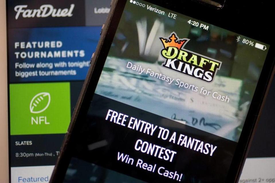 Fantasy sports companies DraftKings Inc. (the app is shown) and FanDuel Inc. (website) raised a total of $575 million in July from investors.