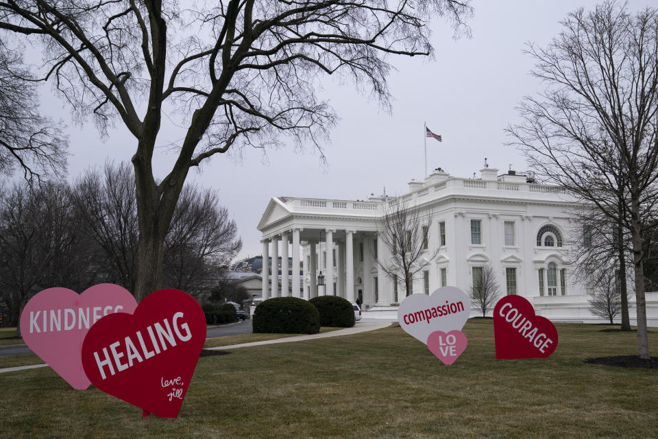 Decorations sit on the North Lawn of the White House, Friday, Feb. 12, 2021, in Washington. (AP Photo/Evan Vucci)