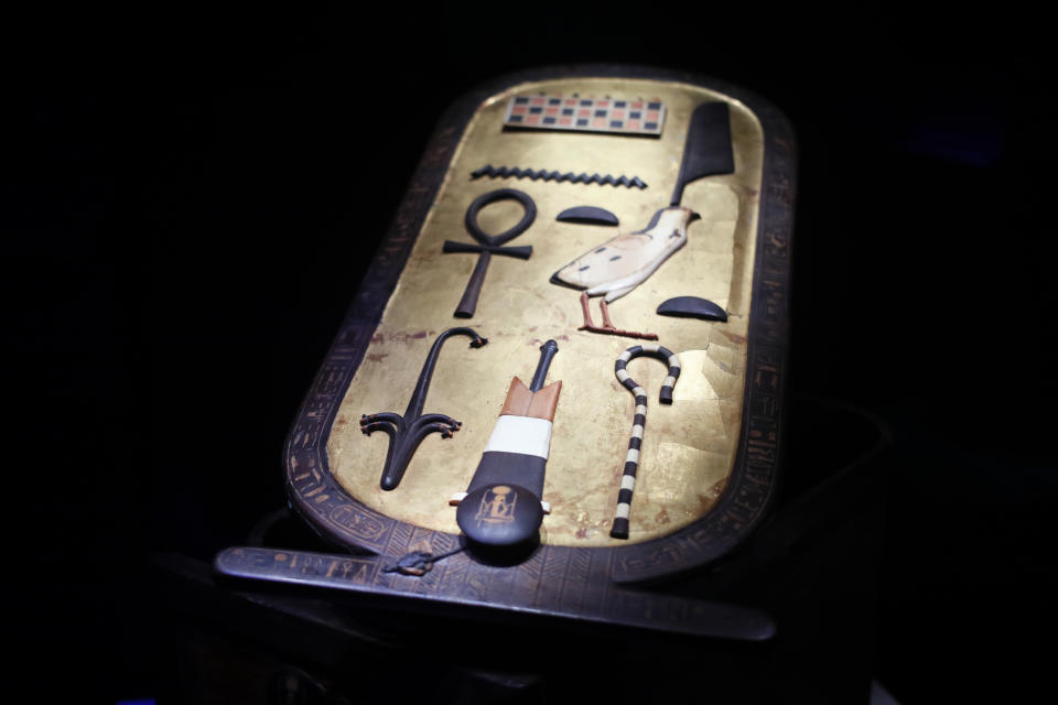 An inlaid wooden cartouche box is displayed as part of 'Tutankhamun, the treasure of the Pharaoh', an exhibition in partnership with the Grand Egyptian Museum at the Grande Halle of La Villette in Paris, France, Thursday, March 21, 2019. This exhibition, which runs from 23 March to 15 September 2019. will reveal 150 fascinating original objects found in 1922 in the tomb of the most famous Pharaoh. (AP Photo/Francois Mori)