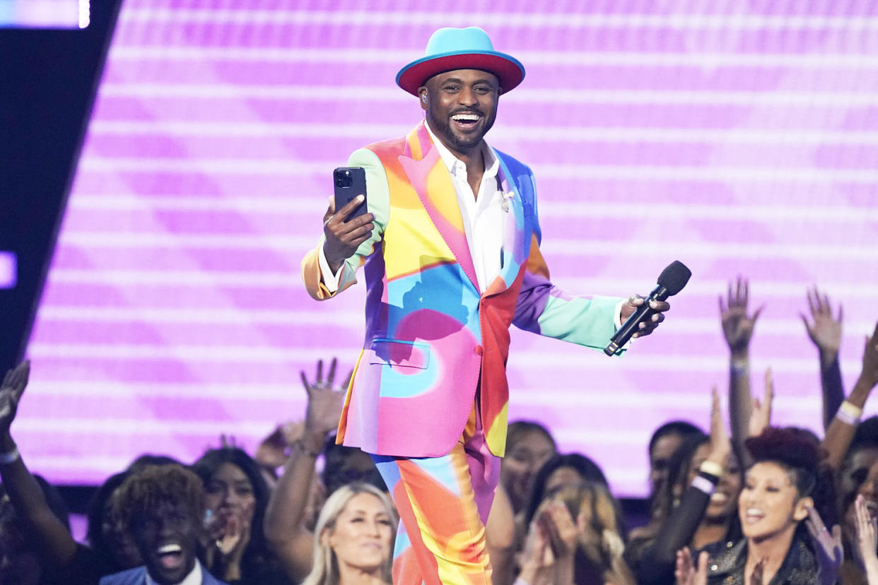 Host Wayne Brady is seen onstage at the American Music Awards on Sunday, Nov. 20, 2022, at the Microsoft Theater in Los Angeles. (Chris Pizzello / Invision/AP file)