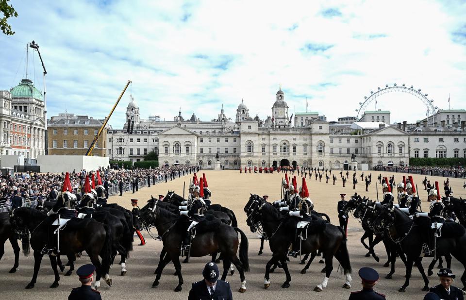 Members of the Household cavalry prepare ahead of the Procession of the coffin of Queen Elizabeth II, at Horse Guards, on its way to Wellington Arch in London on September 19, 2022, after the State Funeral Service of Britain's Queen Elizabeth II.