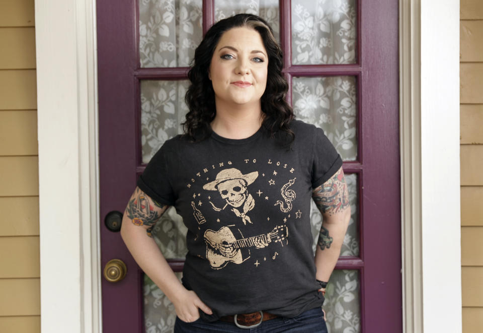 FILE - In this March 5, 2018, file photo, Ashley McBryde poses in Nashville, Tenn. Her new album “Never Will," out on Friday, is full of songs about opinionated women, small town secrets, motel trysts and revenge fantasies. (AP Photo/Mark Humphrey, File)