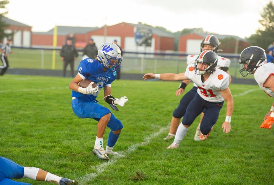 Wynford's Anthony Evans makes a move to avoid Galion's Hunter Miniard.