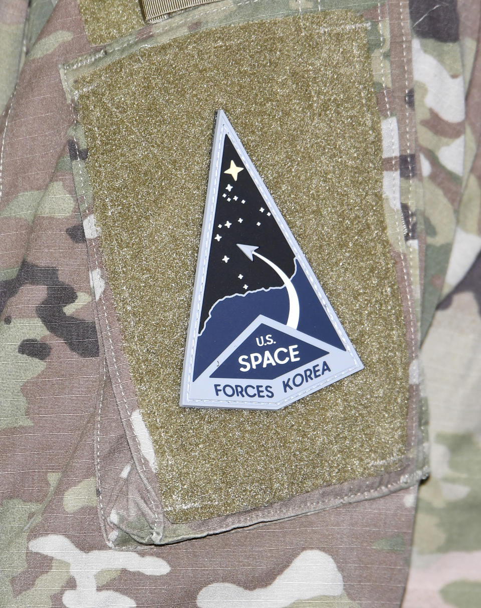 The United States Space Forces Korea patch is seen during the activation ceremony for the United States Space Forces Korea in Pyeongtaek, South Korea Wednesday, Dec. 14, 2022. U.S. military set up space-monitoring organizations, United States Space Forces Korea, in South Korea, aiming to keep an eye on North Korea's nuclear and missile activity as its capabilities continue to improve. (Song Kyung-Seok/Pool Photo via AP)