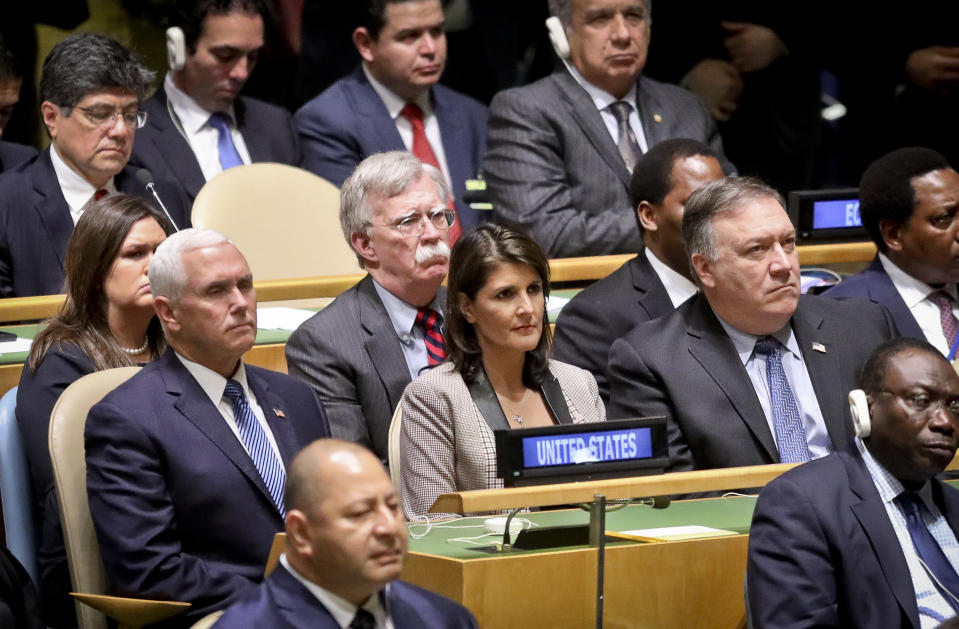 United States delegation Vice President Mike Pence, left center, National security adviser John Bolton, U.N. Ambassador Nikki Haley, second from right, and Secretary of State Mike Pompeo, far right, listens as President Donald address the United Nations General Assembly, Tuesday Sept. 25, 2018 at U.N. headquarters. (AP Photo/Bebeto Matthews)