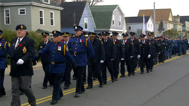 Veterans march through Sydney Mines on Remembrance Day.