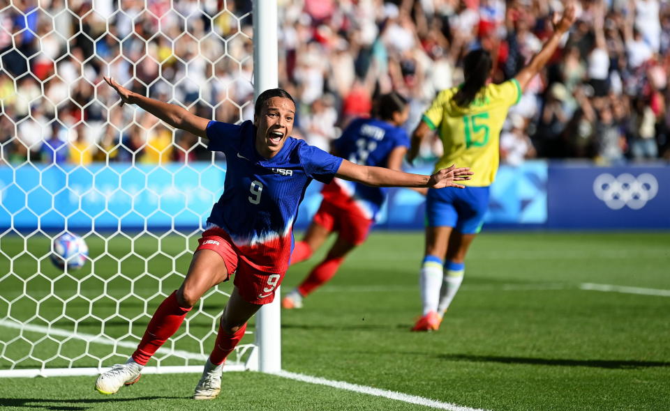 Paris , France - 10 August 2024; Mallory Swanson of Team United States celebrates after scoring her side's first goal during the women's gold medal match between Team Brazil and Team United States at Parc des Princes during the 2024 Paris Summer Olympic Games in Paris, France. (Photo By Stephen McCarthy/Sportsfile via Getty Images)