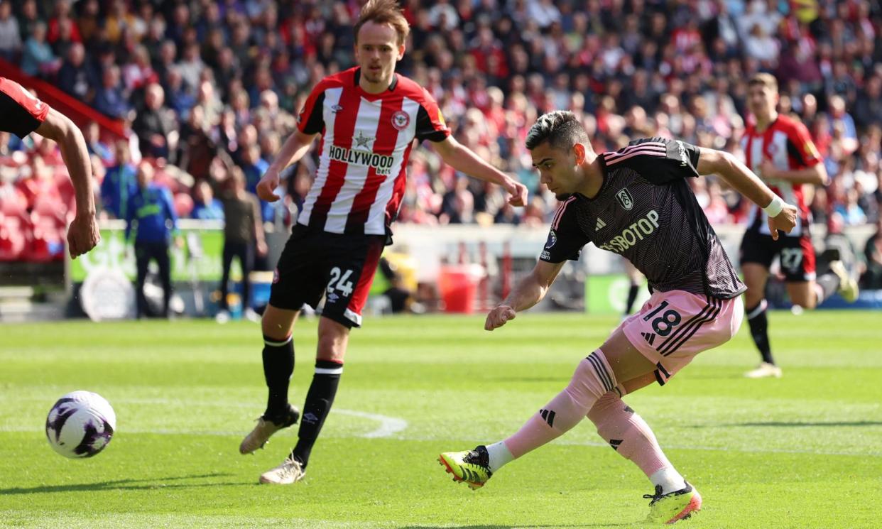<span>Andreas Pereira unleashes a shot for Fulham in their draw at Brentford.</span><span>Photograph: Ian Walton/Reuters</span>