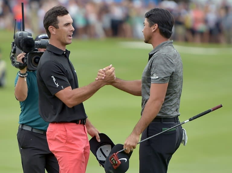 Billy Horschel shakes hands with Jason Day after beating him in a playoff during the Final Round of the Byron Nelson