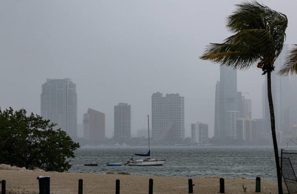 A boat sits on Biscayne Bay as a storm rolls in across the city on Thursday, March 30, 2023, in Miami.