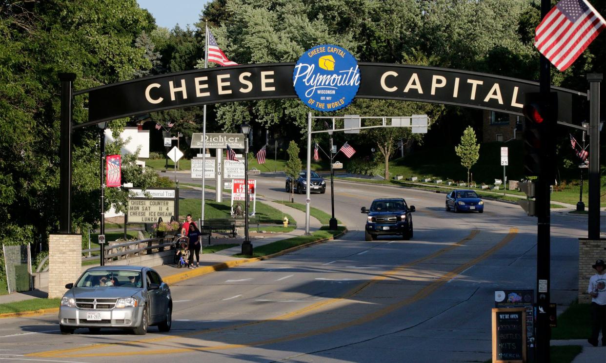 People arrive at the gateway of downtown Plymouth on Aug. 13, 2021.