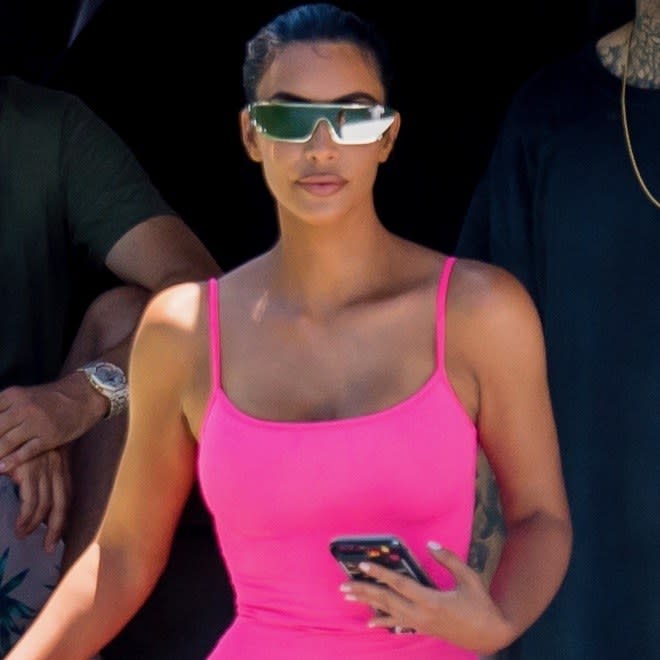 The television star, Kim Kardashian West, stepped out in a bold colored, water friendly piece for a boat trip in Miami.