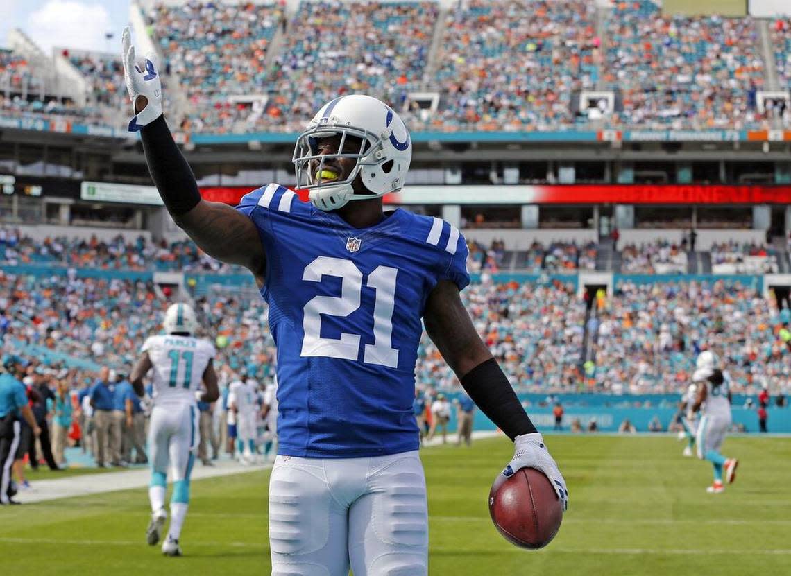 After intercepting Miami Dolphins quarterback Ryan Tennehill in the end zone, Indianapolis Colts’ Vontae Davis celebrates in the first quarter at Sun Life Stadium in Miami Gardens on December 27, 2015.