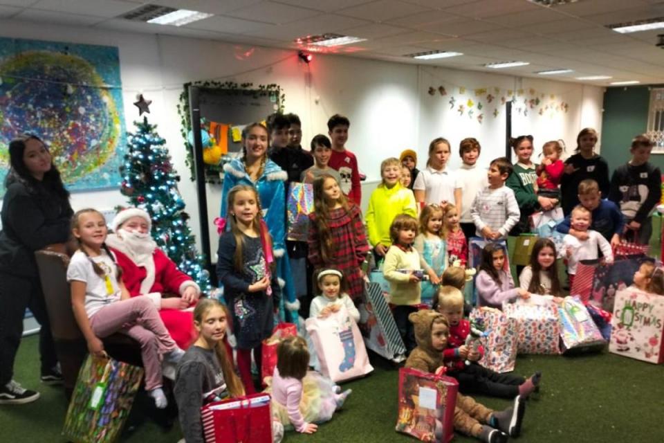 Ukrainian children 'overwhelmed' at gifts from Dunelm's York customers. Pictured: children of York's Ukraine Sunflowers Kids Club with some of their presents <i>(Image: York City of Sanctuary)</i>