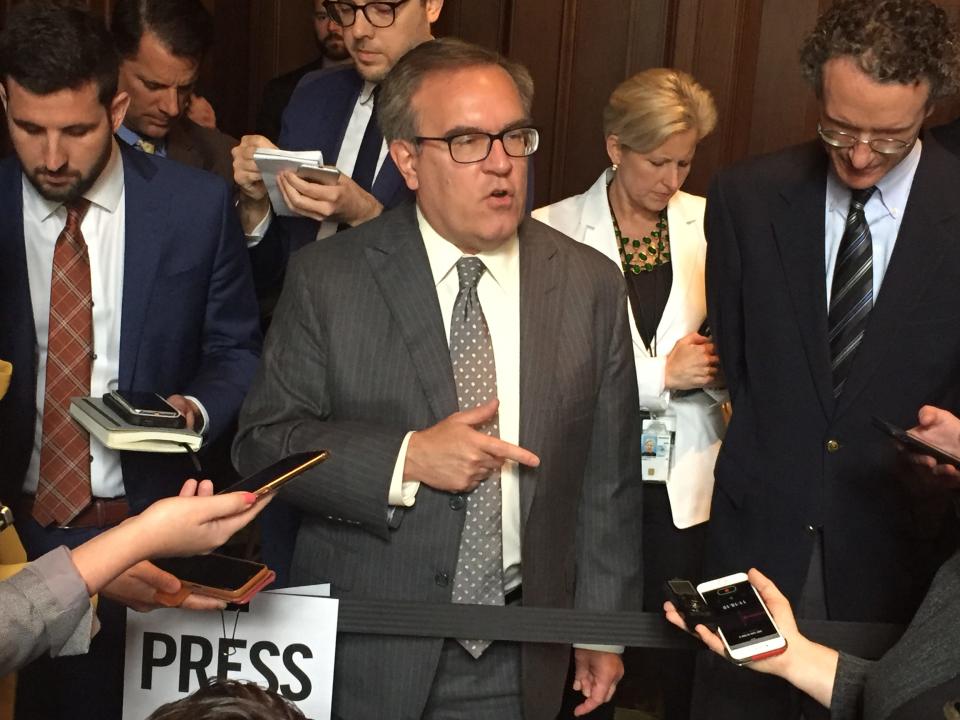 Andrew Wheeler, head of the Environmental Protection Agency, addresses reporters Wednesday at EPA headquarters after announcing the new Affordable Clean Energy (ACE) rule.