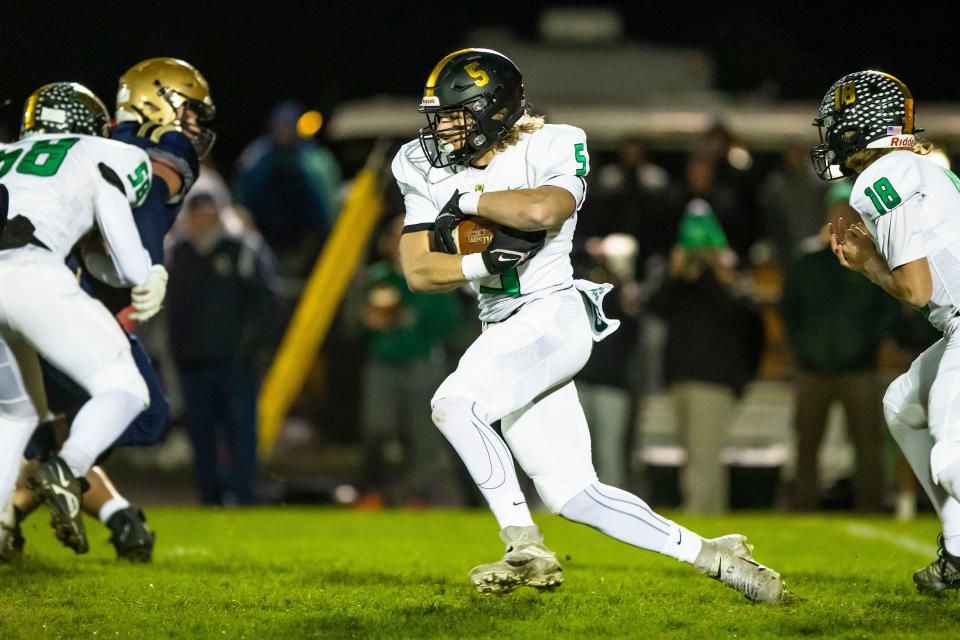 Northridge’s Mcclain Miller (5) runs the ball during the New Prairie vs. Northridge regional championship football game Friday, Nov. 11, 2022 at New Prairie High School in New Carlisle.