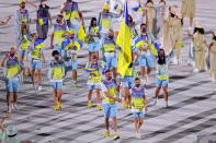 <p>TOKYO, JAPAN - JULY 23: Flag bearers Olena Kostevych and Bogdan Nikishin of Team Ukraine lead their team out during the Opening Ceremony of the Tokyo 2020 Olympic Games at Olympic Stadium on July 23, 2021 in Tokyo, Japan. (Photo by Patrick Smith/Getty Images)</p> 
