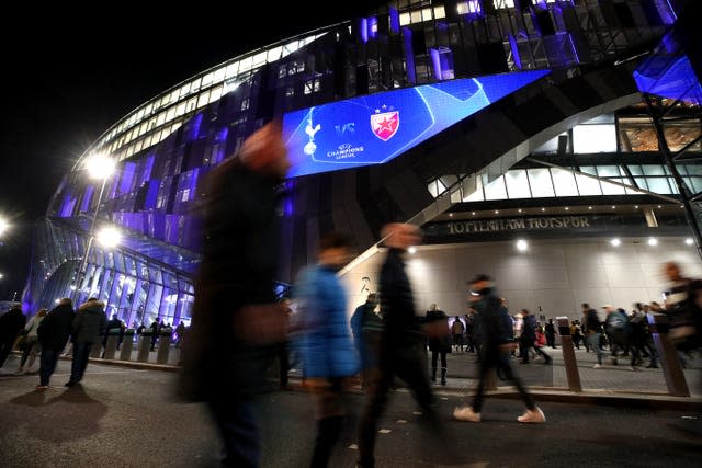 Fans outside the  Tottenham Hotspur Stadium