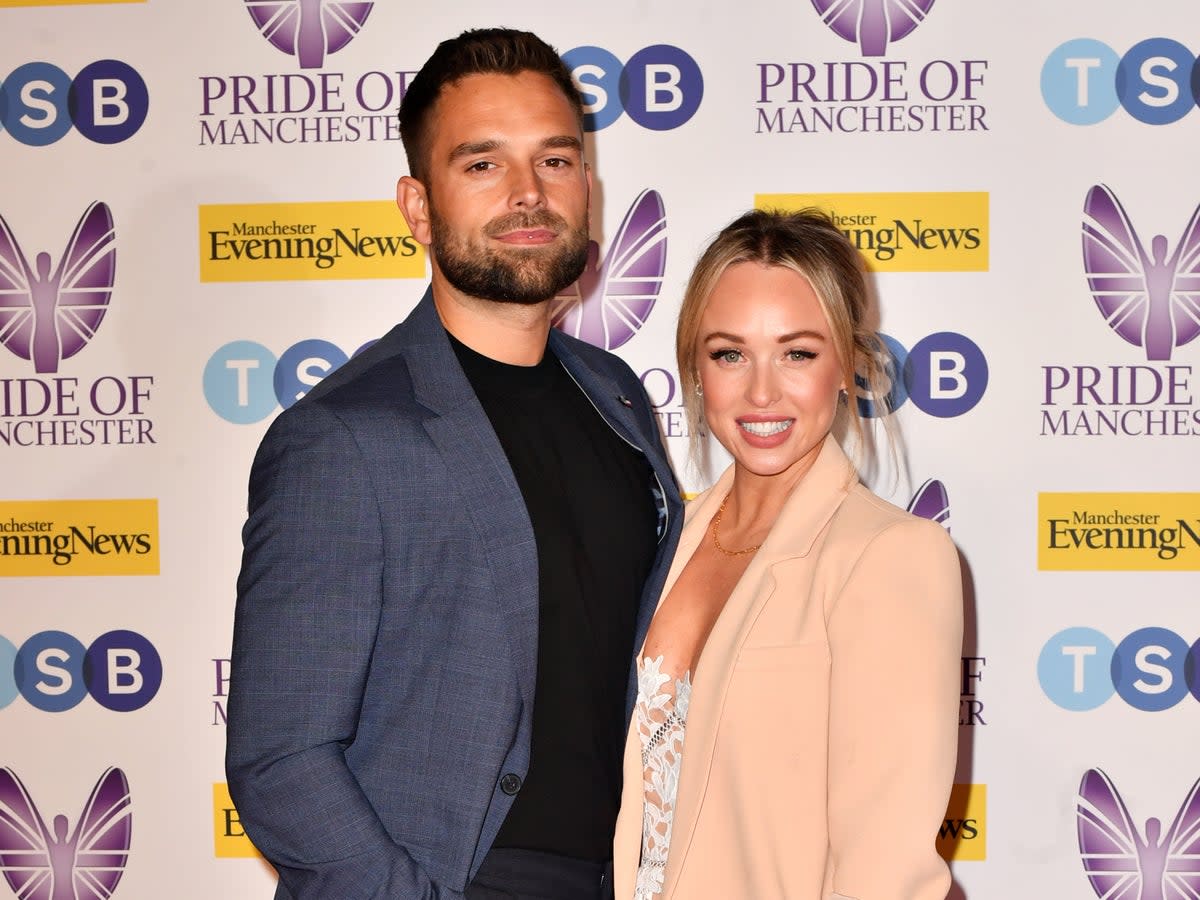 Jorgie Porter (R) and Ollie Piotrowski (L) attend the MEN Pride of Manchester Awards 2022 at Kimpton Clocktower Hotel on May 10, 2022 (Getty Images)