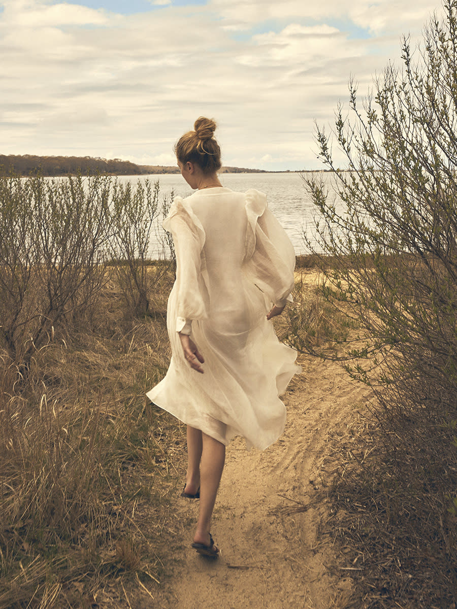 This image released by Elite World shows French model Héloïse Guérin during a photo shoot taken by her husband Victor Demarchelier for the brand Massimo Dutti. The pandemic has accelerated a power shift in the fashion and advertising world, with models and influencers by necessity wielding more control over their own images during remote photo and video shoots. Guérin experienced this first hand, even styling some of her own shoots entirely. Products were mailed to her home where she and her husband, photographer Victor Demarchelier would conduct the shoots. (Victor Demarchelier/Elite World via AP)