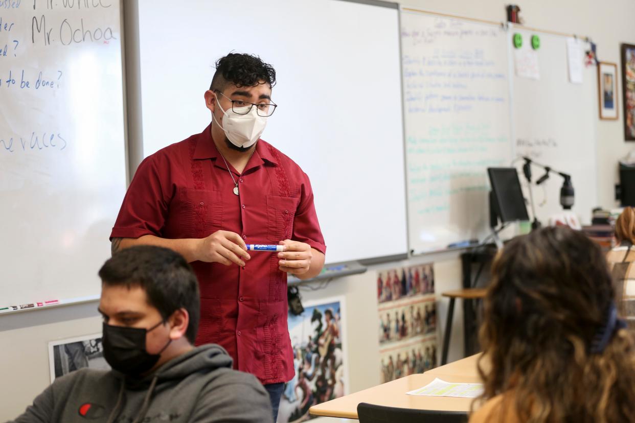 Victor Ochoa, a teaching candidate, talks with students about Chicano culture Jan. 27 at Central High School.