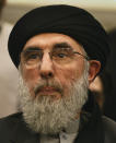 Afghan Warlord Gulbuddin Hekmatyar, leader of Islamist organization Hezb-i-Islami, attends opening session of Afghan Peace Conference in Bhurban, 65 kilometers (40 miles) north of Islamabad, Pakistan, Saturday, June 22, 2019. Dozens of Afghan political leaders attended a peace conference in neighboring Pakistan on Saturday to pave the way for further Afghan-to-Afghan dialogue. (AP Photo/Anjum Naveed)