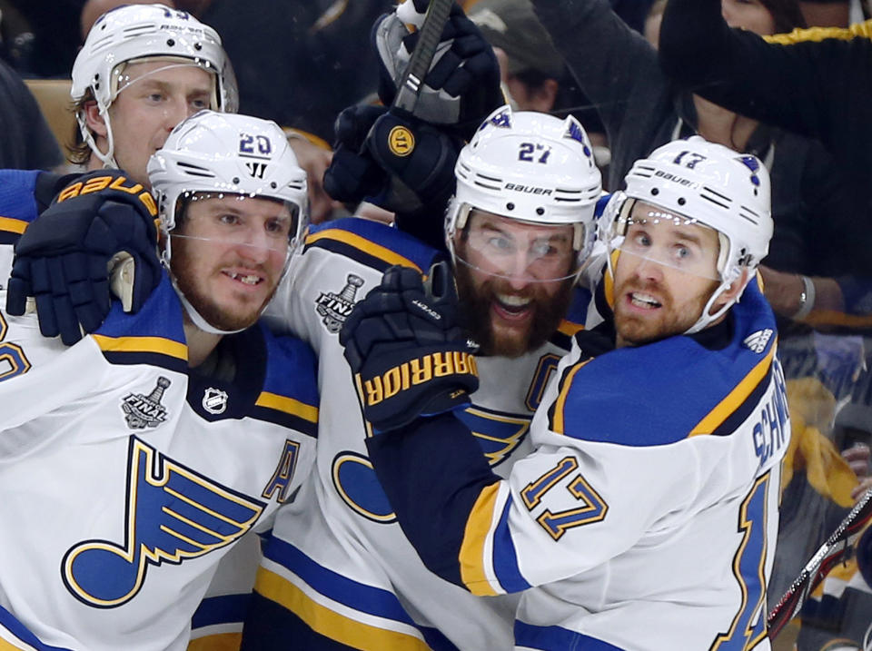 St. Louis Blues' Alex Pietrangelo, second from right, celebrates his goal with teammates Jay Bouwmeester, left rear, Alexander Steen, left, and Jaden Schwartz, right, during the first period in Game 7 of the NHL hockey Stanley Cup Final, Wednesday, June 12, 2019, in Boston. (AP Photo/Michael Dwyer)