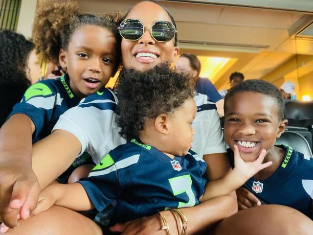 CIARA SHARES ADORABLE PHOTO OF RUSSELL WILSON POSING WITH SON WIN