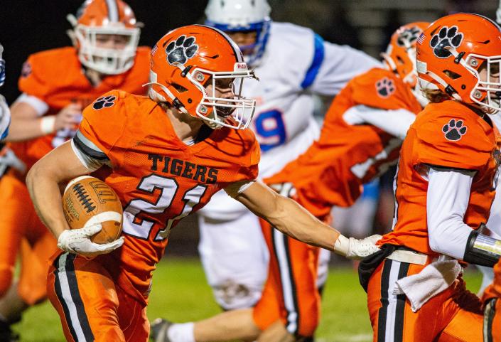 Byron&#39;s Chandler Binkley runs for a touchdown during the second quarter of the Tigers&#39; first-round playoff game in Byron on Friday, Oct. 29, 2021. Byron won and will take on Lisle at home at 1 p.m. Saturday, Nov. 6, 2021.