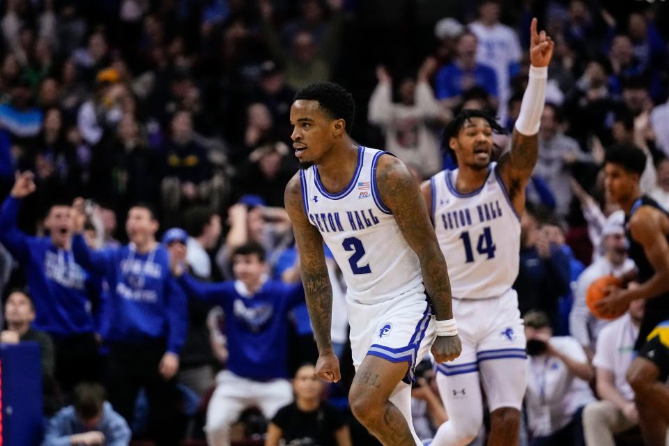 Seton Hall's Al-Amir Dawes (2) reacts after making a three-point shot during the first half of an NCAA college basketball game against Marquette Saturday, Jan. 6, 2024, in Newark, N.J. (AP Photo/Frank Franklin II)