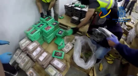 Spanish customs authorities show contents of a record cocaine seizure which was hidden among boxes of bananas in a shipping container in this still image from video in Algeciras, Spain, released April 25, 2018. SPANISH INTERIOR MINISTRY via REUTERS