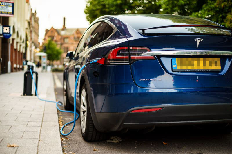 Some Tesla models now allow you to summon them via the app (Getty)