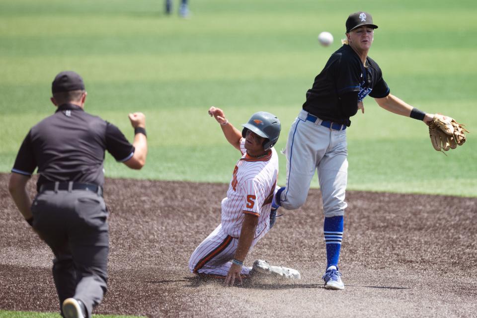 Skyridge’s Isaac Johanson attempts to slide to second base as Pleasant Grove’s Ryker Schow throws to first during a 6A baseball state tournament game at UCCU Ballpark in Orem on Monday, May 22, 2023. | Ryan Sun, Deseret News