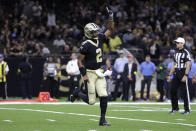 New Orleans Saints quarterback Jameis Winston (2) celebrates after a touchdown by teammate Mark Ingram II during the first half of a preseason NFL football game against the Los Angeles Chargers in New Orleans, Friday, Aug. 26, 2022. (AP Photo/Derick Hingle)