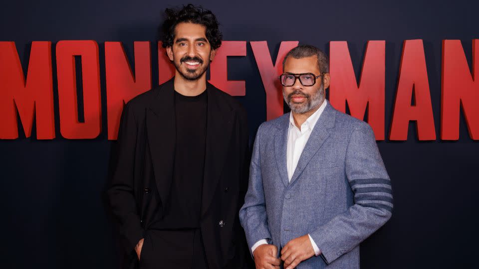 Dev Patel, left, and Jordan Peele pose for photographers upon arrival at the premiere of the film 'Monkey Man' in London on Monday, March 25, 2024. - Vianney Le Caer/Invision/AP