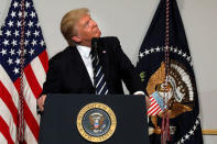 U.S. President Donald Trump delivers remarks at the National Republican Congressional Committee March Dinner in Washington, U.S., March 21, 2017. REUTERS/Carlos Barria