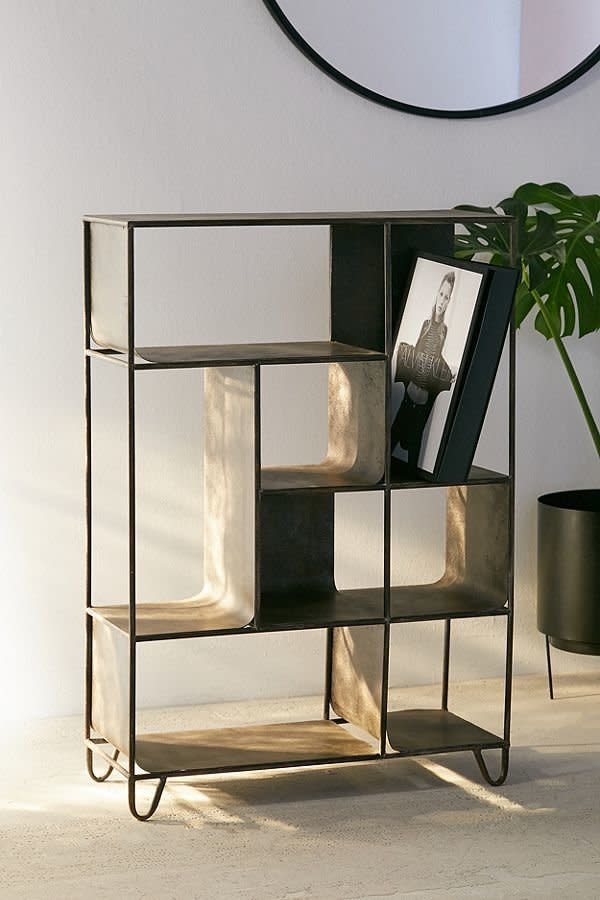 With&nbsp;8 assorted cubbies for optimal storage, <a href="https://www.urbanoutfitters.com/shop/maddox-shelving-unit?category=furniture&amp;color=001" target="_blank">this is a perfect small space investment</a> that's functional but also stylish.